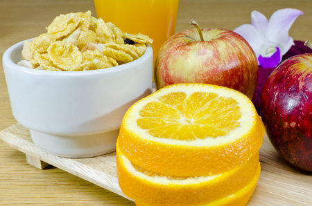 Healthy muesli breakfast with Apples and Orange Juice
