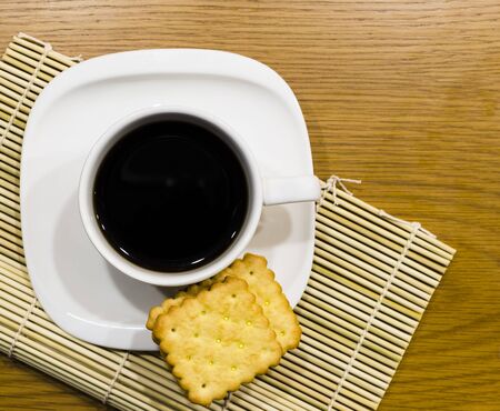 Cup of coffee and Crackers ,vertical viewの写真素材