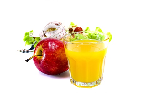 Orange Juice,Apple ,Salad and Tape measurement , for healthy eatingの写真素材