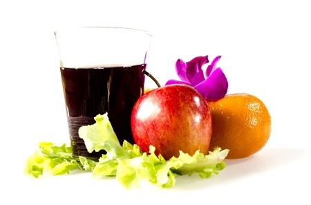 set of healthy fruits and grape juice decorated with purple orchidの写真素材
