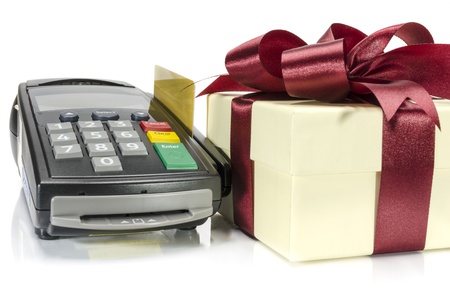 Credit card reader machine and gift box ,isolated on white backgroundの写真素材