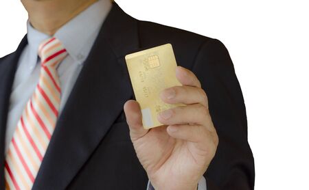 Businessman show credit card for purchase something, isolated on white backgroundの写真素材