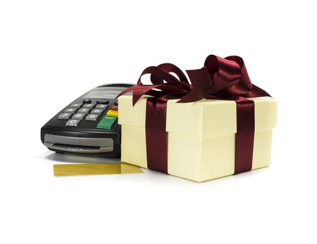Credit card reader machine and gift box ,isolated on white backgroundの写真素材