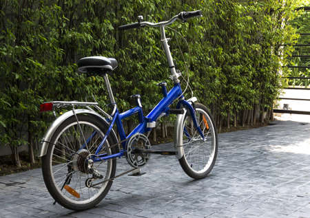 New bicycle standing on stone floorの写真素材