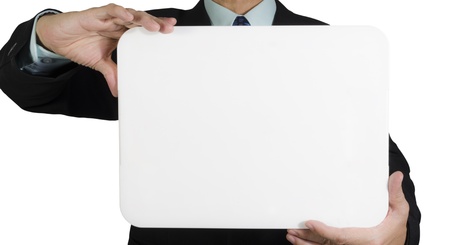 Businessman showing blank white board, isolated on white backgroundの写真素材