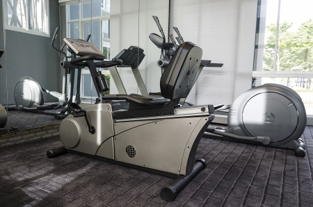 elliptical cross trainer and  treadmill in club houseの写真素材