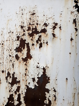rusty and scratched zinc wall backgroundの写真素材