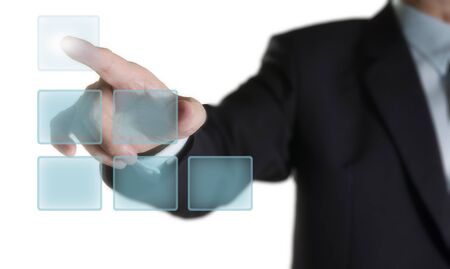 Business man hand pointing on virtual screen , isolated on white backgroundの写真素材