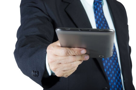 Businessman hand holding and using digital tablet, isolated on white backgroundの写真素材