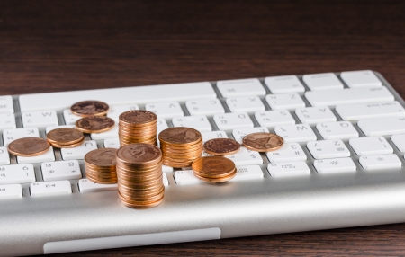 Computer keyboard and coins :Concept for make money from webの写真素材