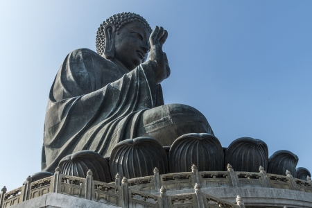 The Tian Tan Buddha in Hong Kong under blue sky の写真素材