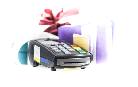 Credit card and card reader machine and  gift box on background ,isolated on white backgroundの写真素材