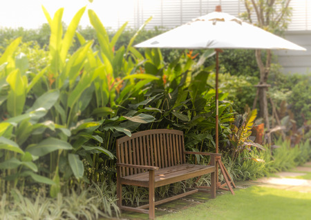 Relaxation corner with leisure chair and umbrella in the gardenの写真素材