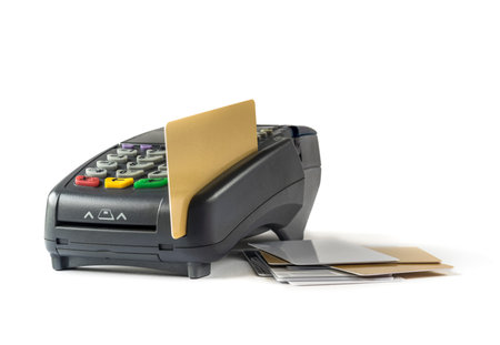 Credit card and card reader machine isolated on white background