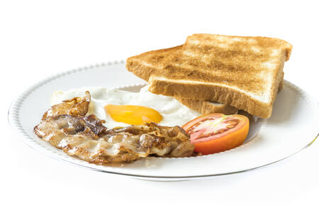 Bacon, eggs and toast breakfast , isolated on white backgroundの写真素材