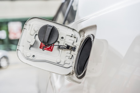 Petrol cap cover on a car wait for refuelの写真素材