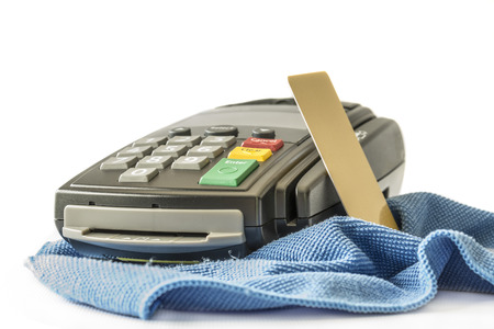 Credit card and card reader , isolated on white backgroundの写真素材