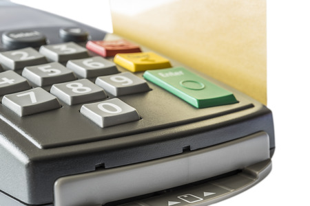Close up of credit card reader machine , isolated on white backgroundの写真素材