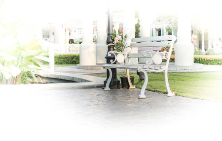 White outdoor chair in the gardenの写真素材