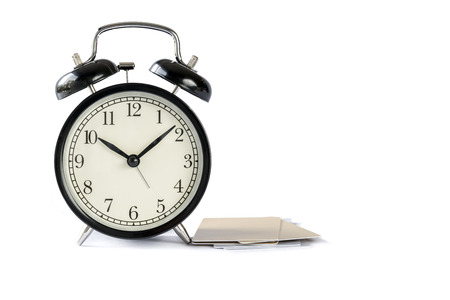 Alarm clock and credit card, isolated on white background : concepts and ideasの写真素材