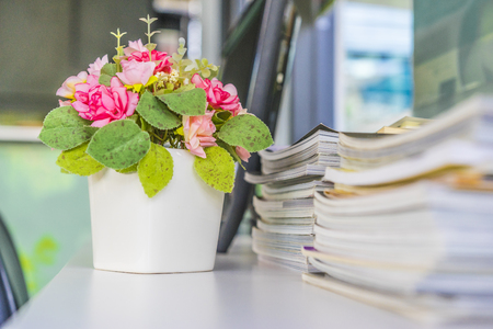 Artificial flower on the office desk : Depth of fieldの写真素材