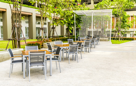 Outdoor cafe in front of condominiumの写真素材