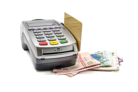 Credit card and card reader machine with banknotes , isolated on white backgroundの写真素材