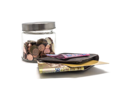 Leather wallet with credit and money , Isolated on white backgroundの写真素材