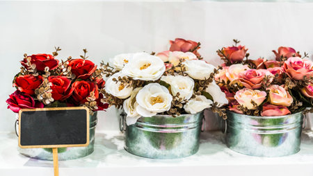 Colorful artificial flowers in a flower shopの写真素材