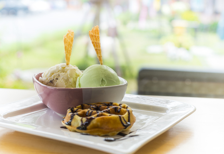 Waffle with ice cream and chocolateの写真素材