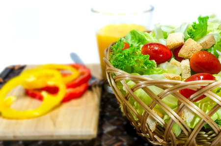 Healthy salad with depth of field , focus on basketの写真素材