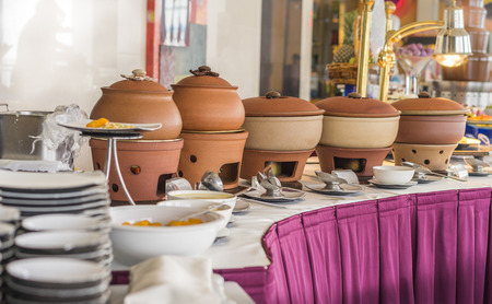 Buffet heated clay pot ready for serviceの写真素材