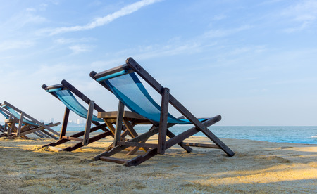 Two beach chairs and clear blue skyの写真素材