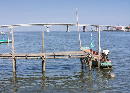 Fishing boat in Thailand estuaryの写真素材