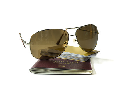 Passport , sun glass  and credit card , Isolated on white backgroundの写真素材