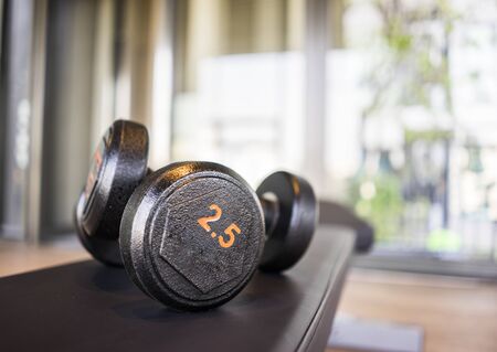 Dumbbell on the floor in fitness roomの写真素材