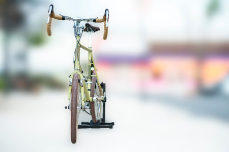 Front view of touring bicycle standing , isolated on blurred backgroundの写真素材