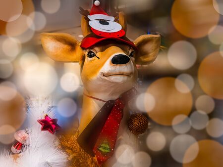 Reindeer Christmas decoration with blurred backgroundの写真素材