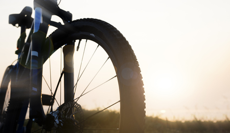 Close up of bicycle park at countryside in the morning with lens flare effectの写真素材
