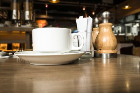 Cup of coffee on table in cafe : Selective focusの写真素材