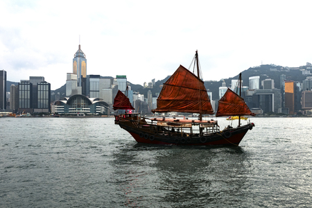 Retro style of Junk boat with in Hong Kong at Victoria Harbourの写真素材