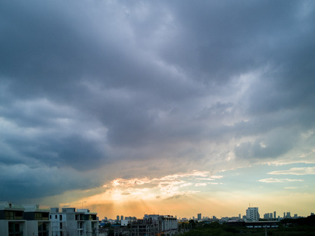 Urban skyline in the morning with cloudy sky before rainの写真素材