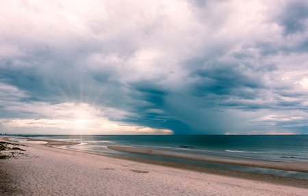 Cloudy sky in the morning ocean before stormの写真素材
