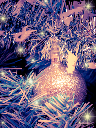 Christmas decorated on Artificial pine tree backgroundの写真素材