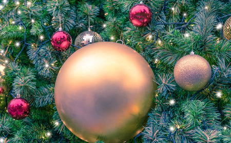 Christmas decorated on Artificial pine tree backgroundの写真素材