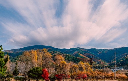 Beautiful rural scene of autumn landscape at mountain hill in Japanの写真素材