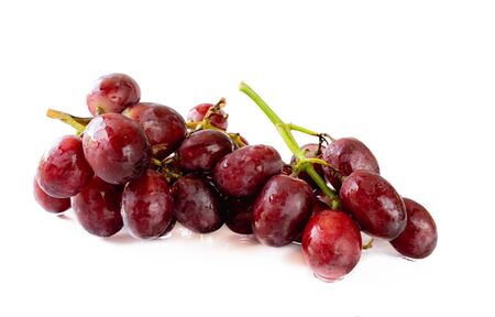 Fresh bunch of red grapes , Isolated on white backgroundの写真素材