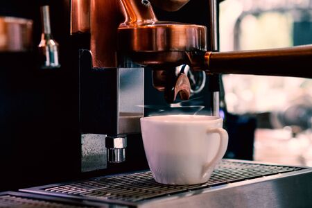 Hot coffee prepare by professional coffee machineの写真素材