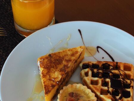 Breakfast : Waffle, Toast and Orange Juiceの写真素材
