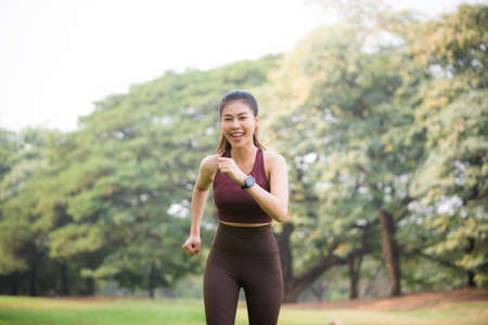 Asian woman is warm up, To make the muscles flexible Before going to jogging for good health and energy
metabolism,Outdoors cross training workout. Healthcare conceptの写真素材